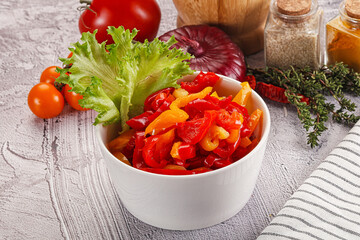 Diced raw bell red and yellow pepper