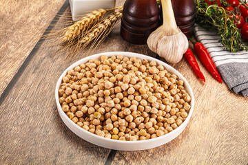 Dry chickpea seeds heap in the bowl
