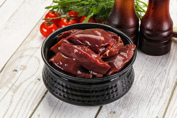 Raw chicken liver uncooked in the bowl