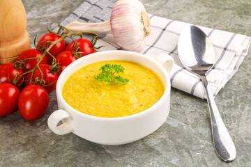 Vegetarian corn cream soup served parsley