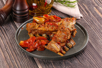 Baked lamb ribs with vegetables