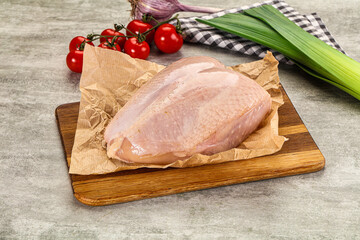 Raw chicken breast with bone