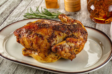 Baked in oven whole chicken with spices