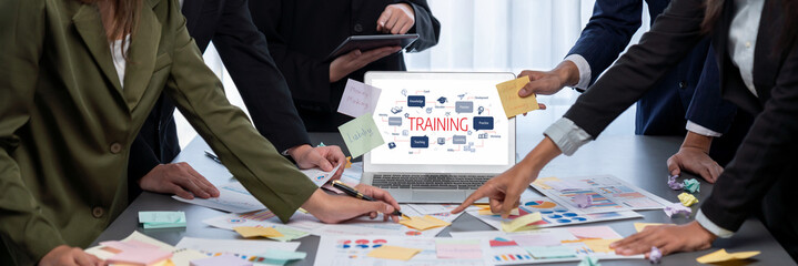 Analyst team use sticky note for creative and analytic brainstorm for business idea with BI data dashboard on laptop screen. Analysis financial data visualization tech for marketing strategy. Prodigy