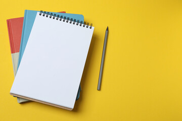 school notebook, pen, spiral notebook on the table. flat lay