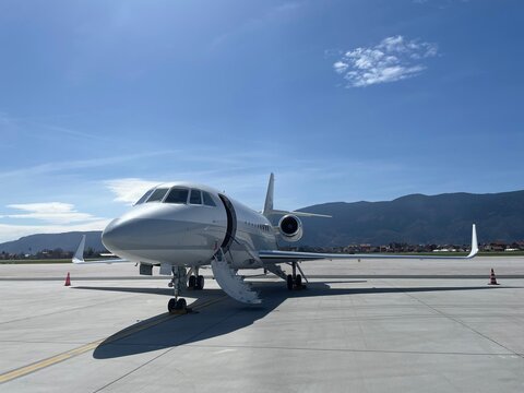 business jet ready for boarding, private jet at the apron before departure