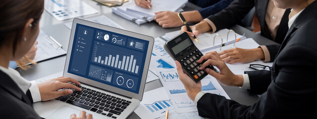 Business intelligence and data analysis concept. Analyst team working on financial data analysis...