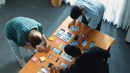 Top view of smart Ui designer brainstorming and planning about Ux Uo design or mobile interface...