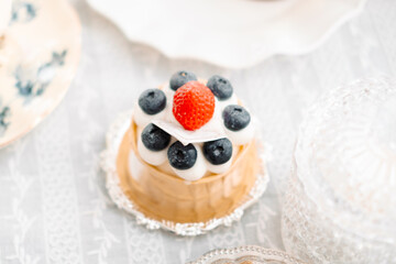 waffle cake with airy filling and berries. Aesthetic cake on the table