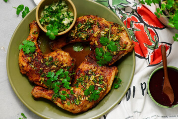 Grilled chicken legs with cilantro, garlic and hot sauce.top veiw