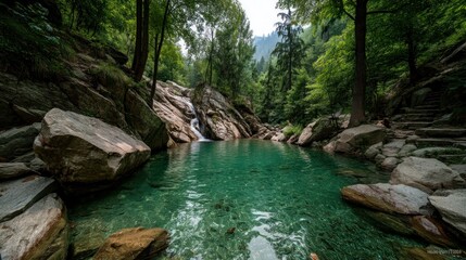 Fototapeta premium Serene turquoise pool nestled in a lush, green forest