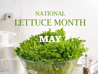 Green fresh lettuce leaf in the glass bowl on the kitchen background and words National lettuce month May . The concept of starting a diet, weight loss, healthy eating