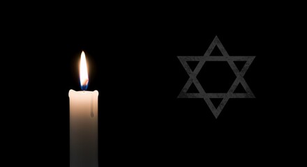 Burning candle and Star of David on black background. Jewish remembrance concept. Holocaust Memorial Day. Space for text. Yom HaShoah commemoration.