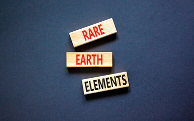 Rare earth elements symbol. Concept words Rare earth elements on beautiful wooden block. Beautiful...