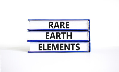 Rare earth elements symbol. Concept words Rare earth elements on beautiful books. Beautiful white...