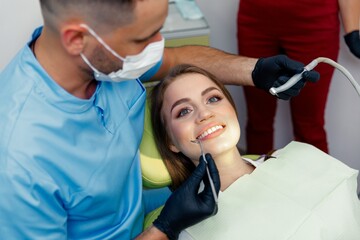 dental procedure, dentist chair, Dental treatment, smiling patient, female patient, Dentist...