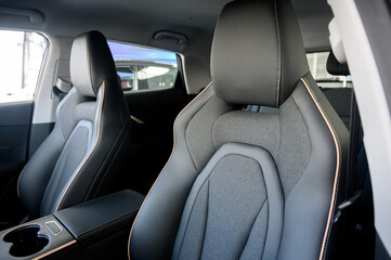 Interior of a modern car with black leather seats