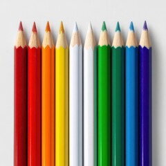 Brightly colored pencils arranged in a line showcasing a spectrum of colors for art or creative projects