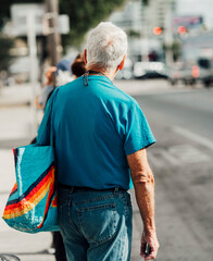 elderly man waiting for the bus 
