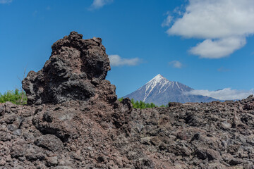 Slag fields with a volcano in the background