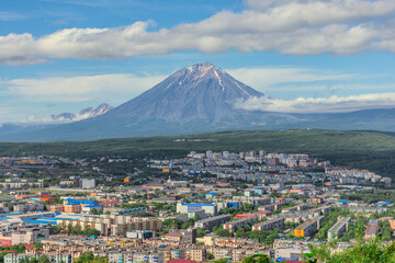 City with a volcano in the background