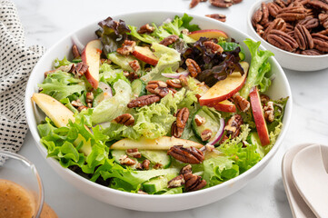 Apple Pecan Salad on a White Marble Countertop