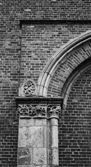 Black And White Close Up Of Ornate Brick Arch