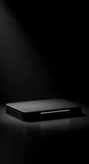 Black Platform Under Spotlight on Dark Background