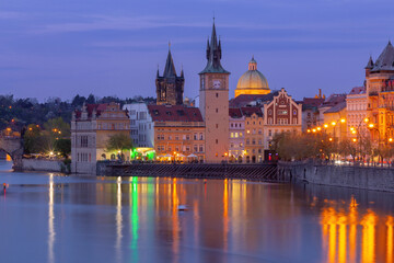 Fototapeta premium Vltava River and Old Town Water Tower in Prague Czech Republic