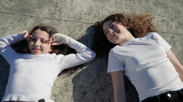 relaxing moment between sisters