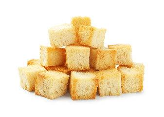 Many delicious crispy croutons isolated on white