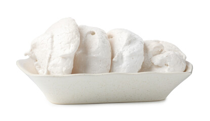 Delicious homemade meringue cookies in bowl isolated on white