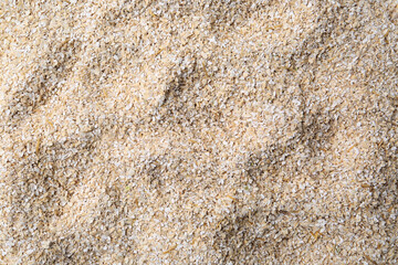 Superfood product. Oat powder as background, closeup