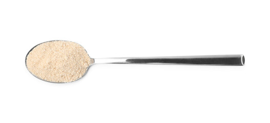 Superfood product. Sesame seeds powder in spoon isolated on white, top view