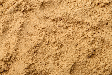 Superfood. Turmeric powder as background, top view