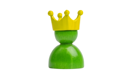 A green wooden figure wears a yellow crown, symbolizing royalty and authority