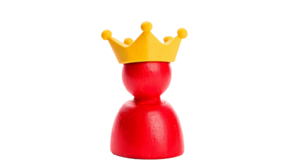 a figure of a wooden red king with a yellow crown
