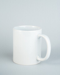Two-tone 11oz mug on isolated background. Mug with black handle and inner part.
