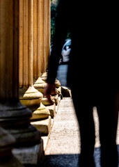 Silhouette of a man walking in a city