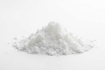 Pile of white sugar crystals on white background, studio, texture, refined