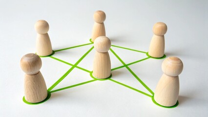 Obraz premium Connection and Community: Symbolic figurines stand together, linked by a network of interconnected lines, representing unity, synergy, and the power of collaboration.