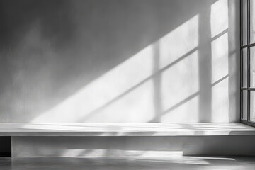 Gray room with sunlight shadows