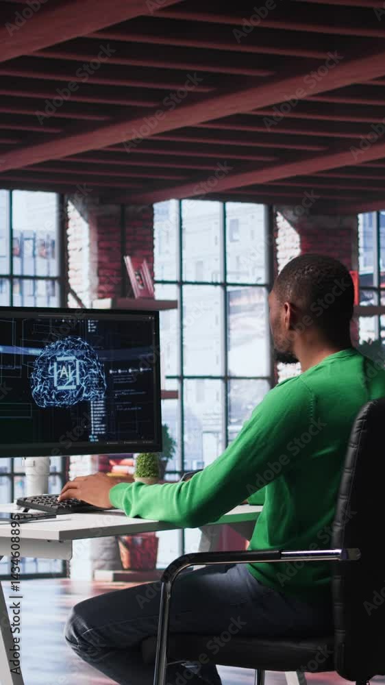 Poster Vertical Video African american technician writes code on AI brain neural network for machine learning, doing maintenance and debugging the software systems. IT expert uses programming language