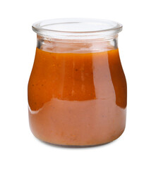 Tasty curry sauce in glass jar isolated on white