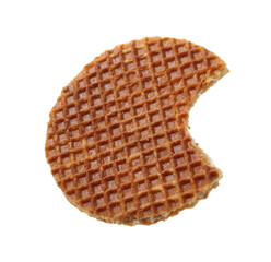 Bitten round Dutch waffle isolated on white