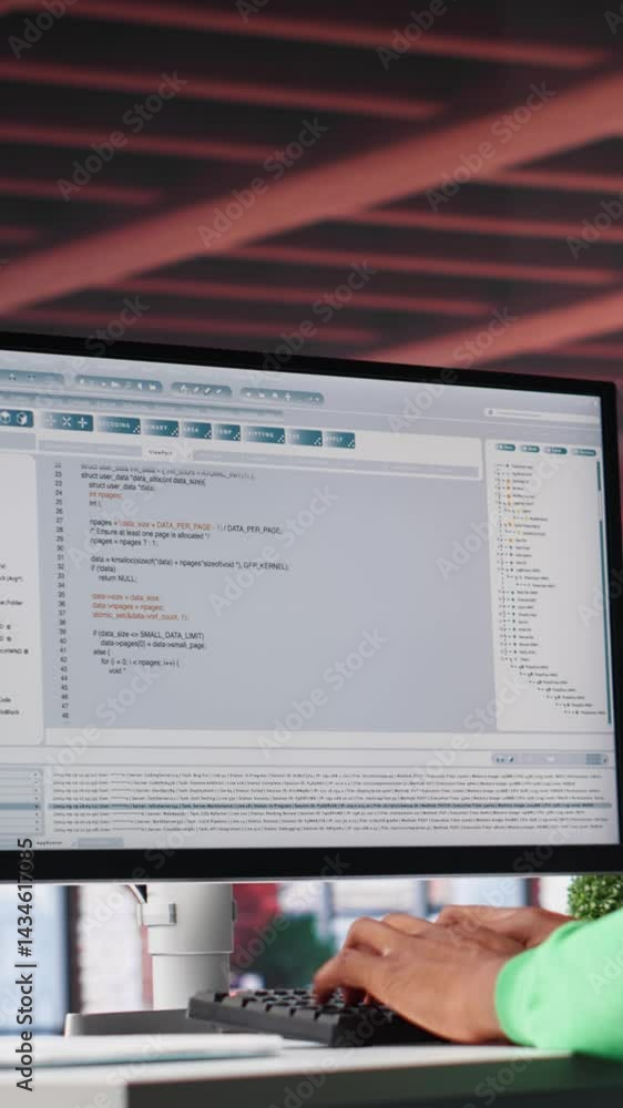 Fototapete Vertical Video Tech savvy black engineer developing secure online program at home. Surrounded by binary data, freelancer works on interface design, script optimizations and network systems. Camera A.