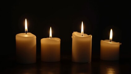 candles on black background