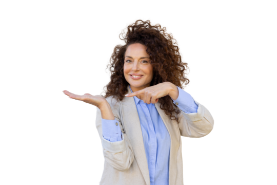 Smiling businesswoman presenting and pointing at something on her empty hand