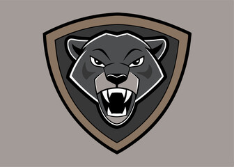 Heraldic Emblem: A fierce and imposing illustration of a bear's head, emblazoned within a shield, representing strength and protection.