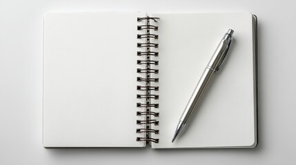 Blank Notebook with Silver Pen on Table